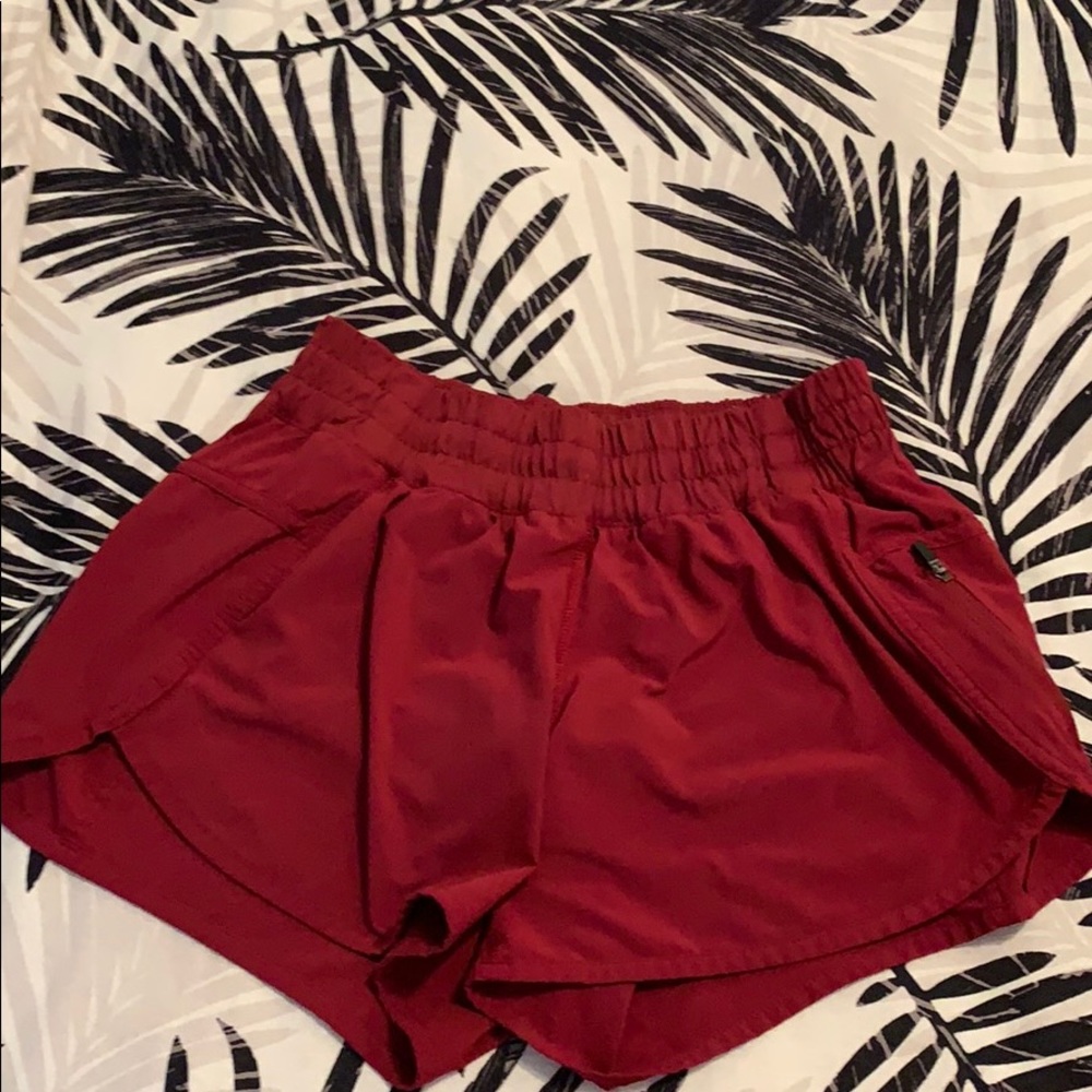 Red tracker lululemon shorts.